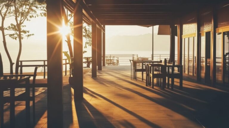A photo of an outside of a resort during sunrise.
