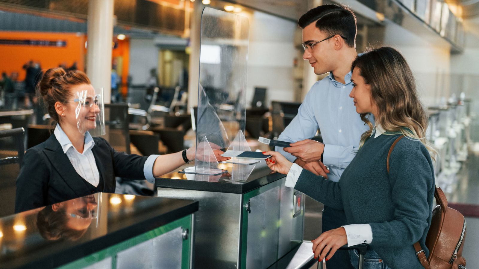 A photo of Travelers passport control airport.