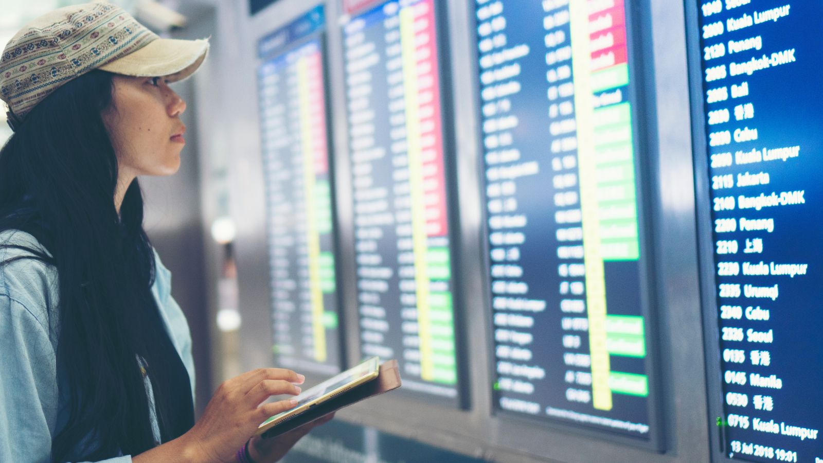 A photo of a Traveler reviewing flight options.