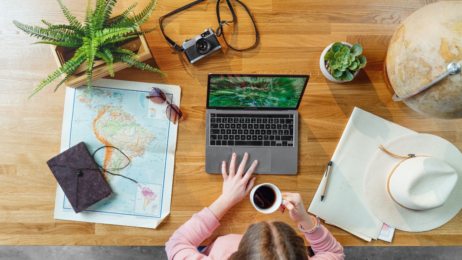 A photo of a Traveler planning meaningful trip laptop.