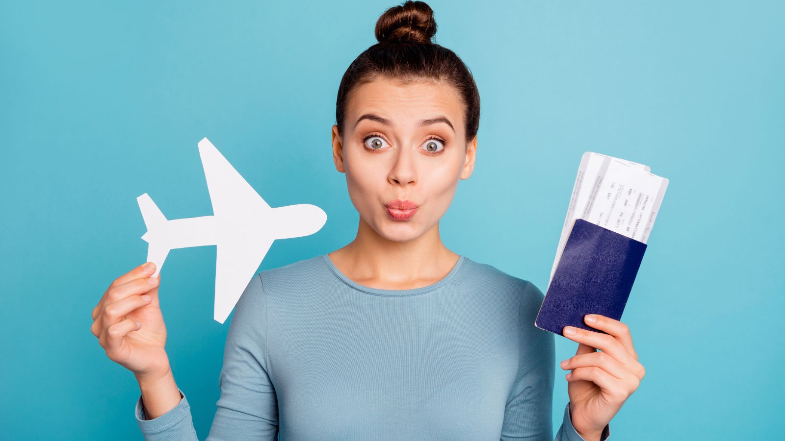 A photo of a Traveler showing return ticket.