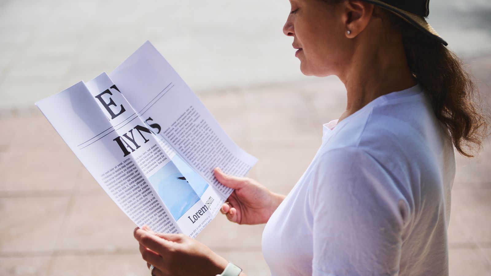 A photo of a Traveler reading travel brochure.