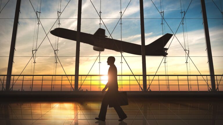 A photo of a man and a plane.
