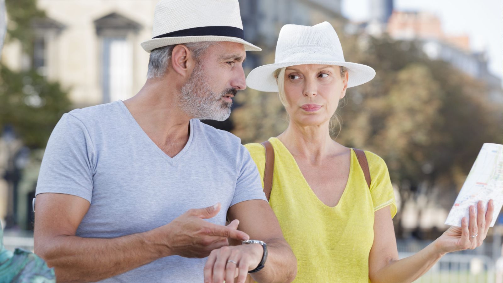 A photo of a couple that shows bitter expression, looks like discussing about something they do not mutually agree.