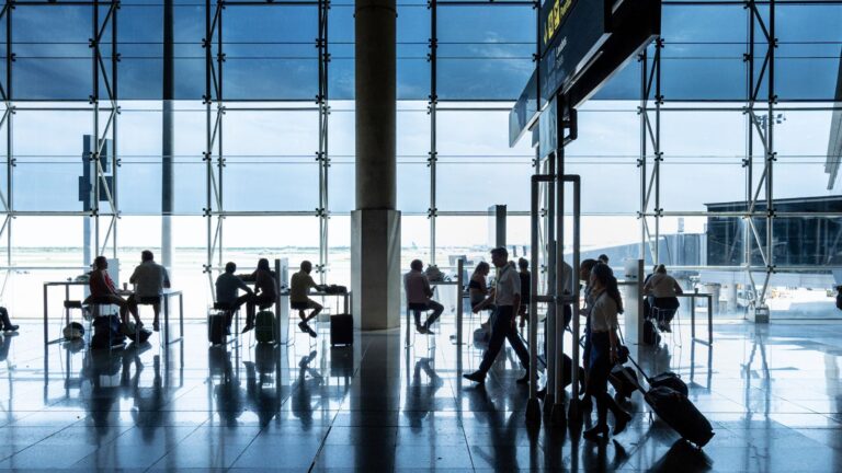 A photo of a crowded airport terminal.
