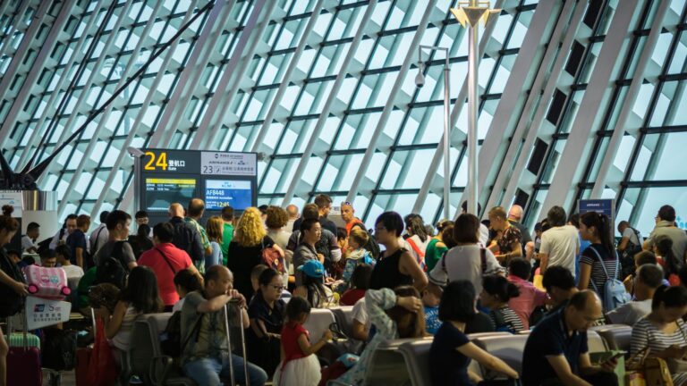 A photo that shows off a traveler calm airport window morning.