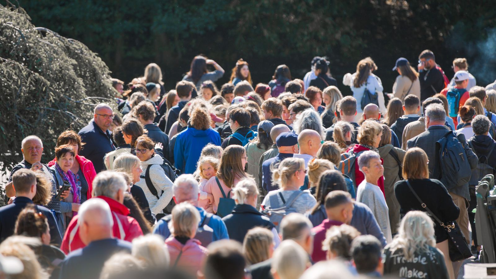 A photo of crowded sightseeing exhaustion fatigue.