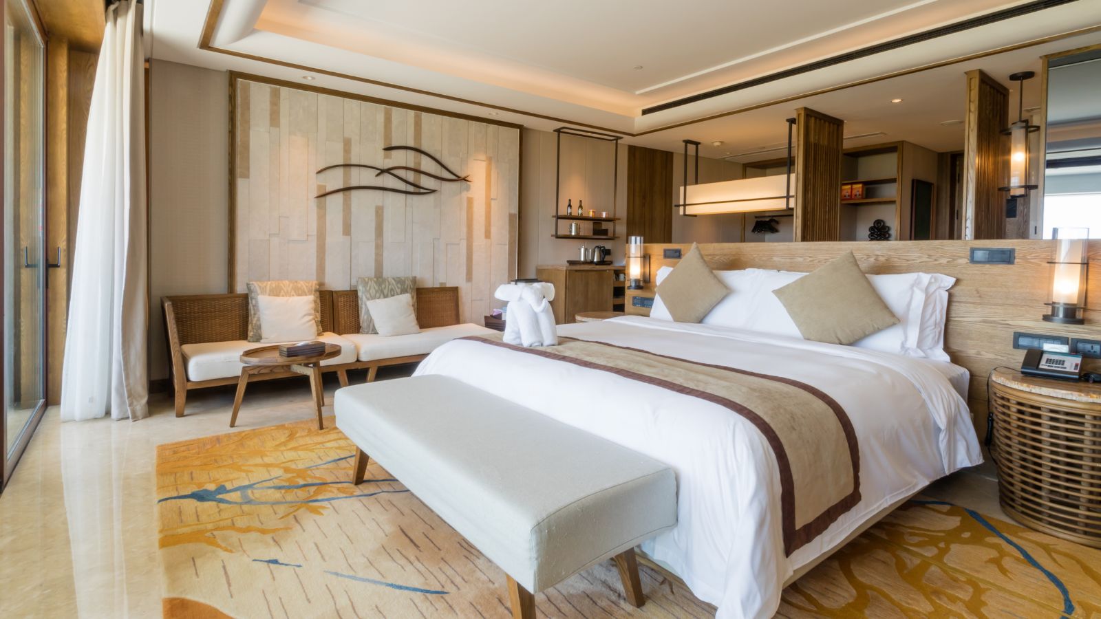 A photo of a luxury hotel room awkward furniture placement.