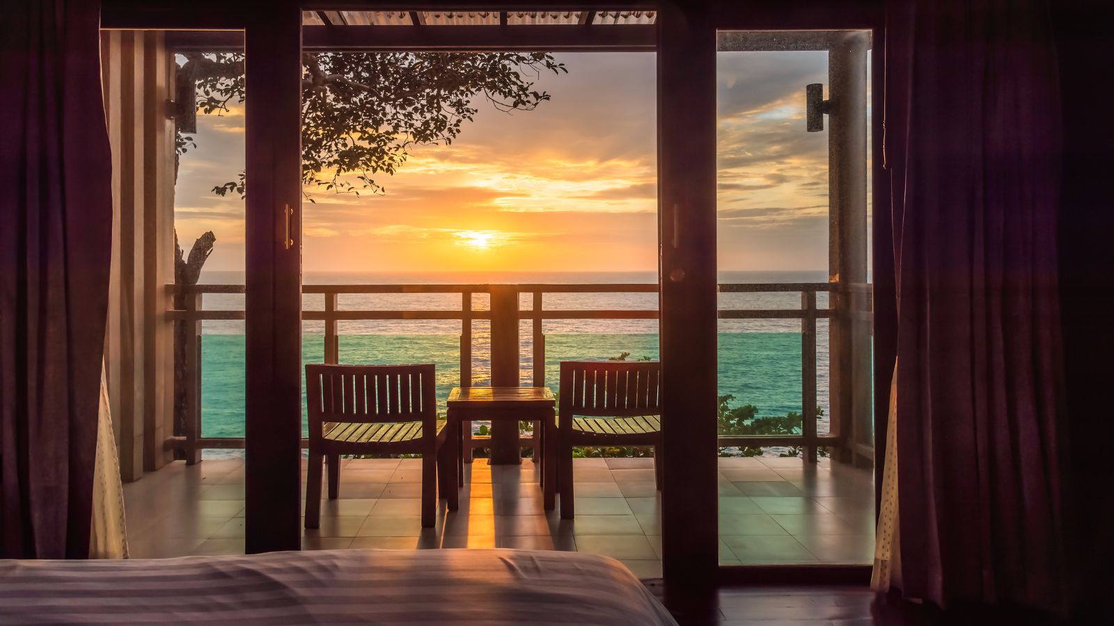 A photo of a hotel balcony sunrise quiet.