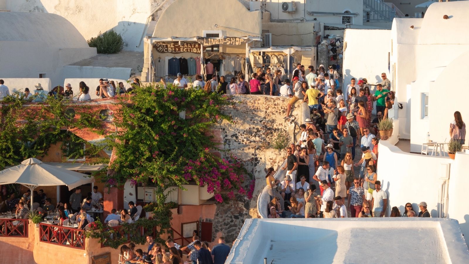Tourists in Greece crowding the walkways.