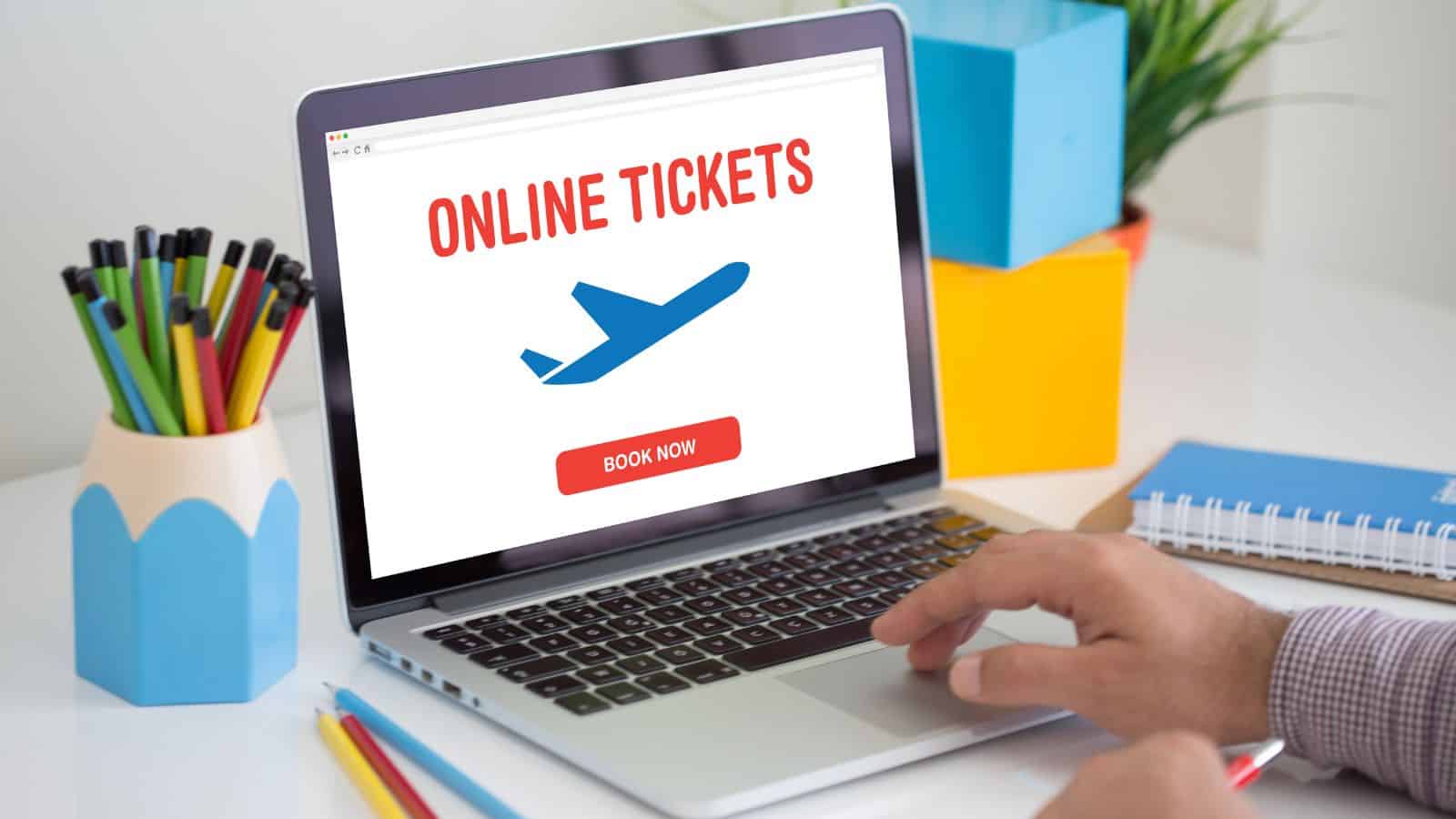 A person uses a laptop showing an online ticket booking site with an airplane icon and "BOOK NOW" button.
