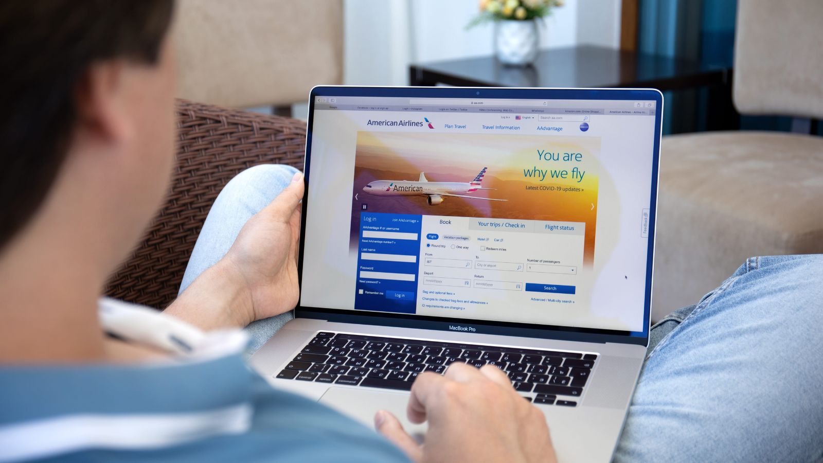 A photo of airline booking page showing extra charges for baggage, seat selection, and add-on fees increasing the total price.