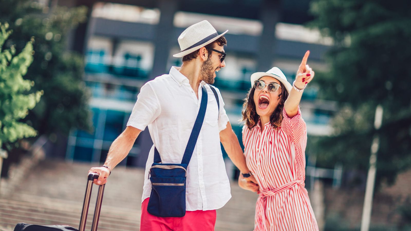 A photo of a couple traveler looking so excited.
