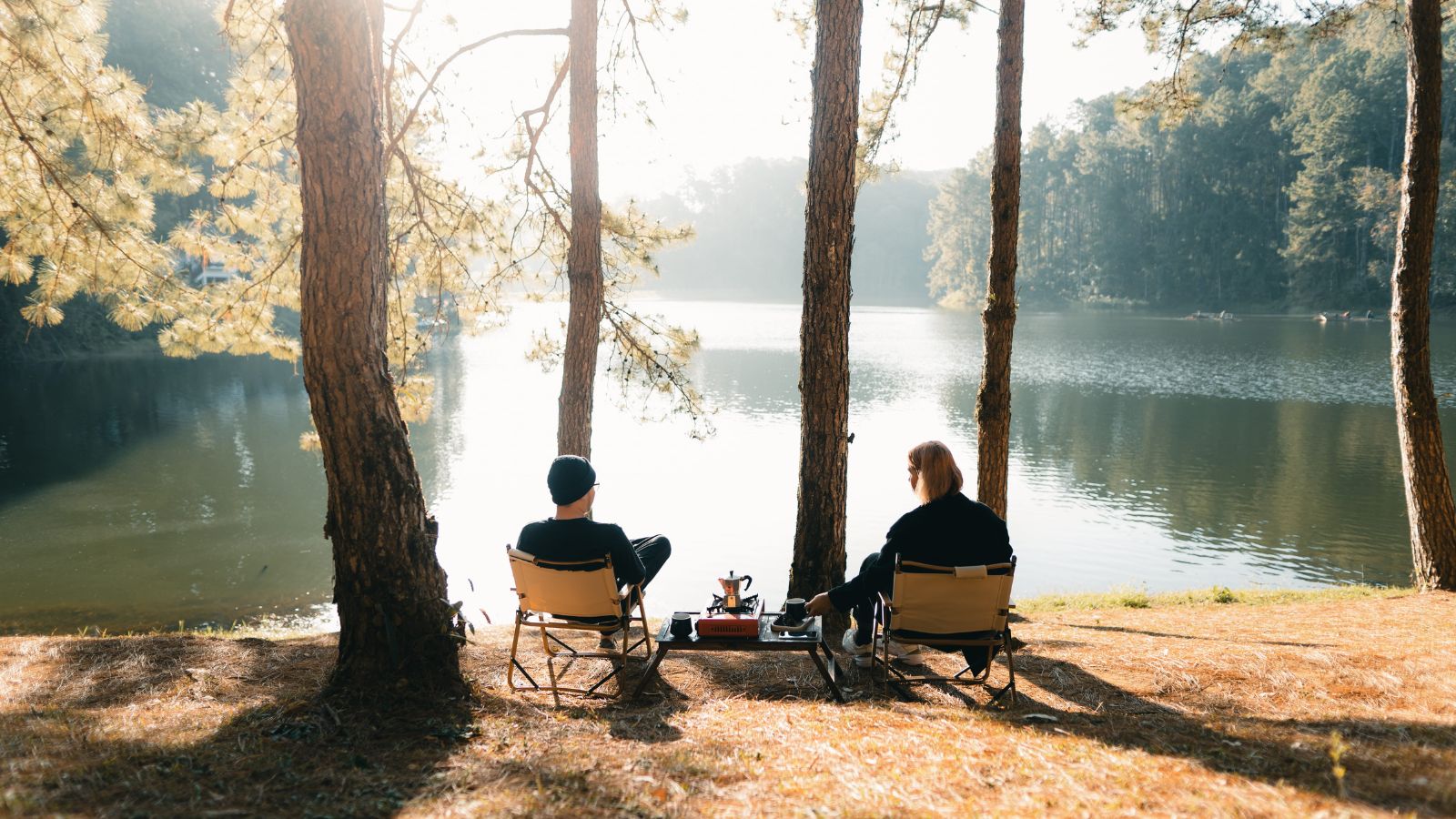 A photo of romantic couple relaxing together in peaceful setting intimate calm connection effortless romantic getaway.
