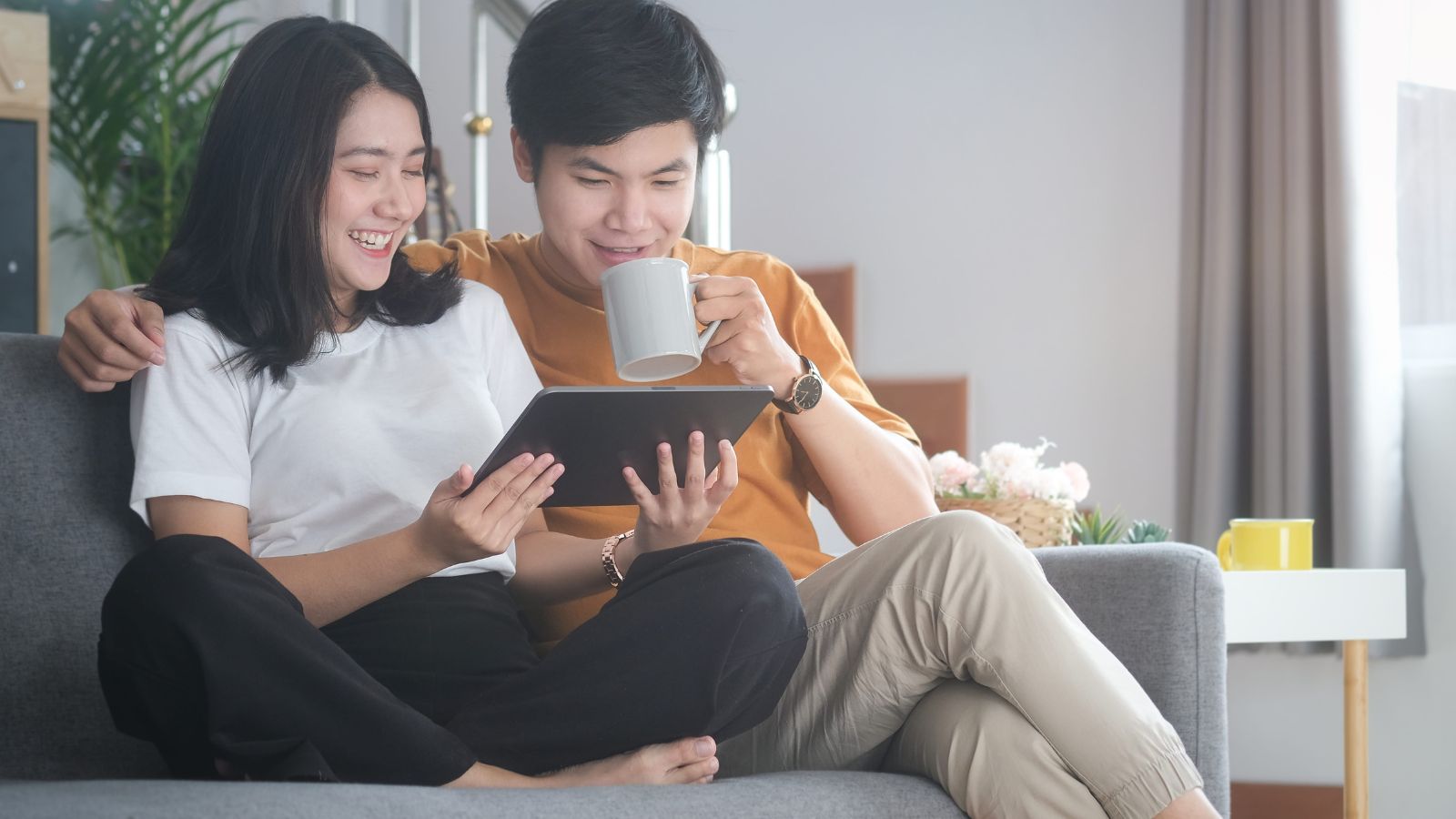 A photo of a romantic couple sitting together enjoying peaceful moment.