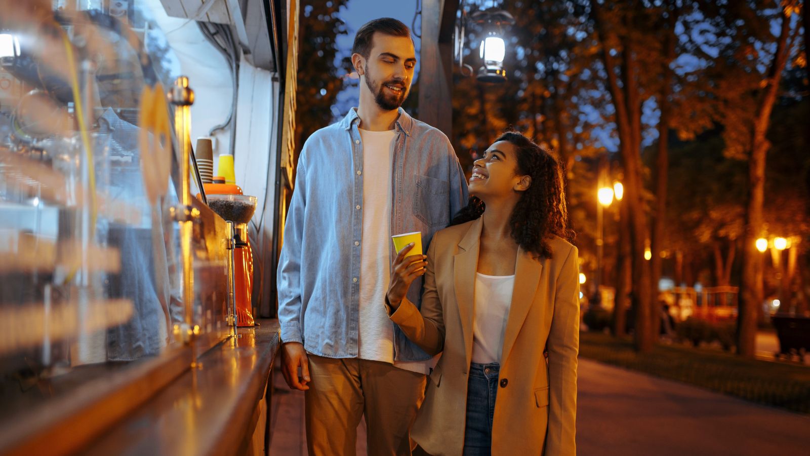 A photo of a romantic couple enjoying slow walk or quiet coffee together relaxed intimate moment unhurried travel experience.