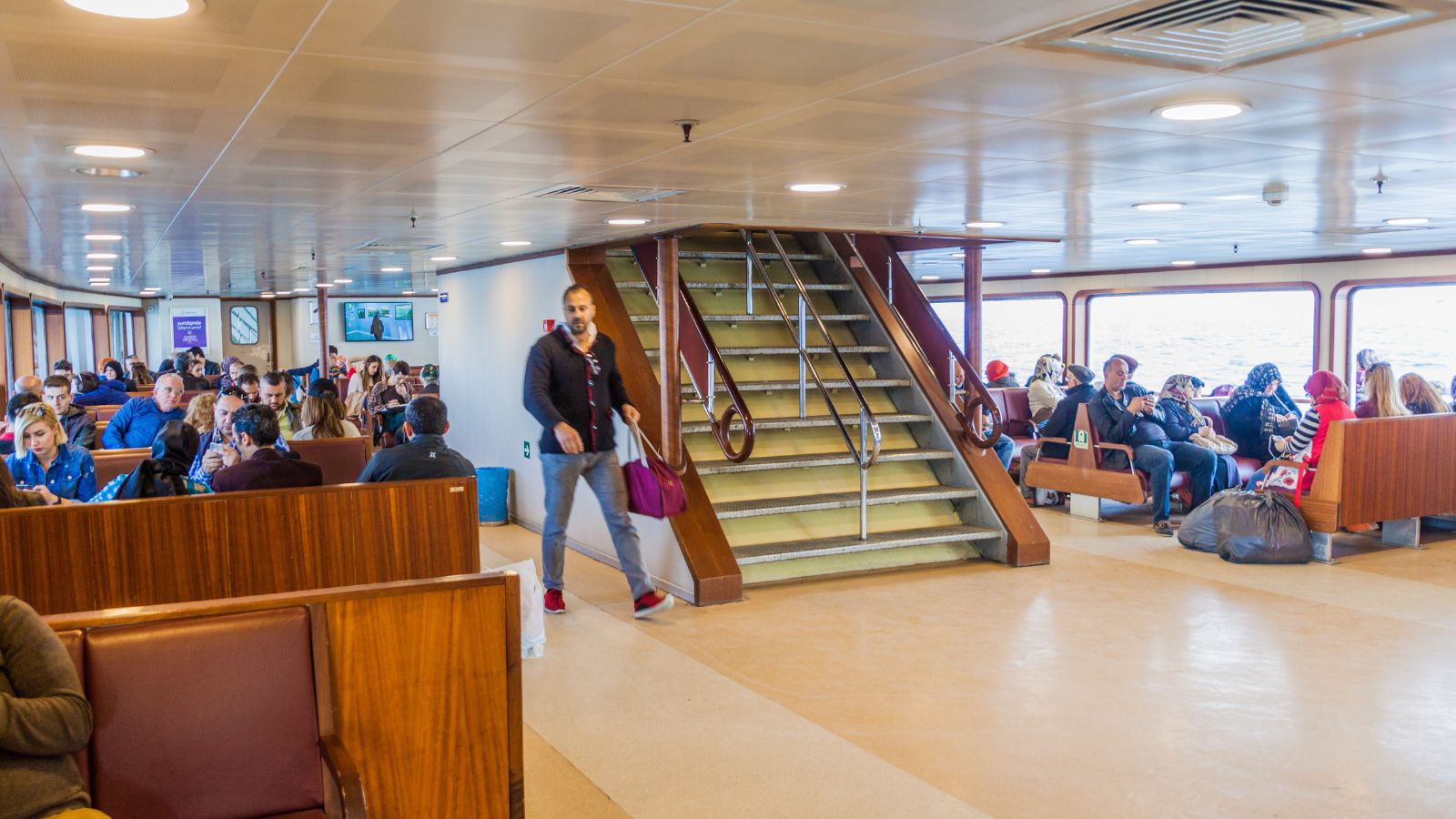 A photo of a cruise floor with passengers.