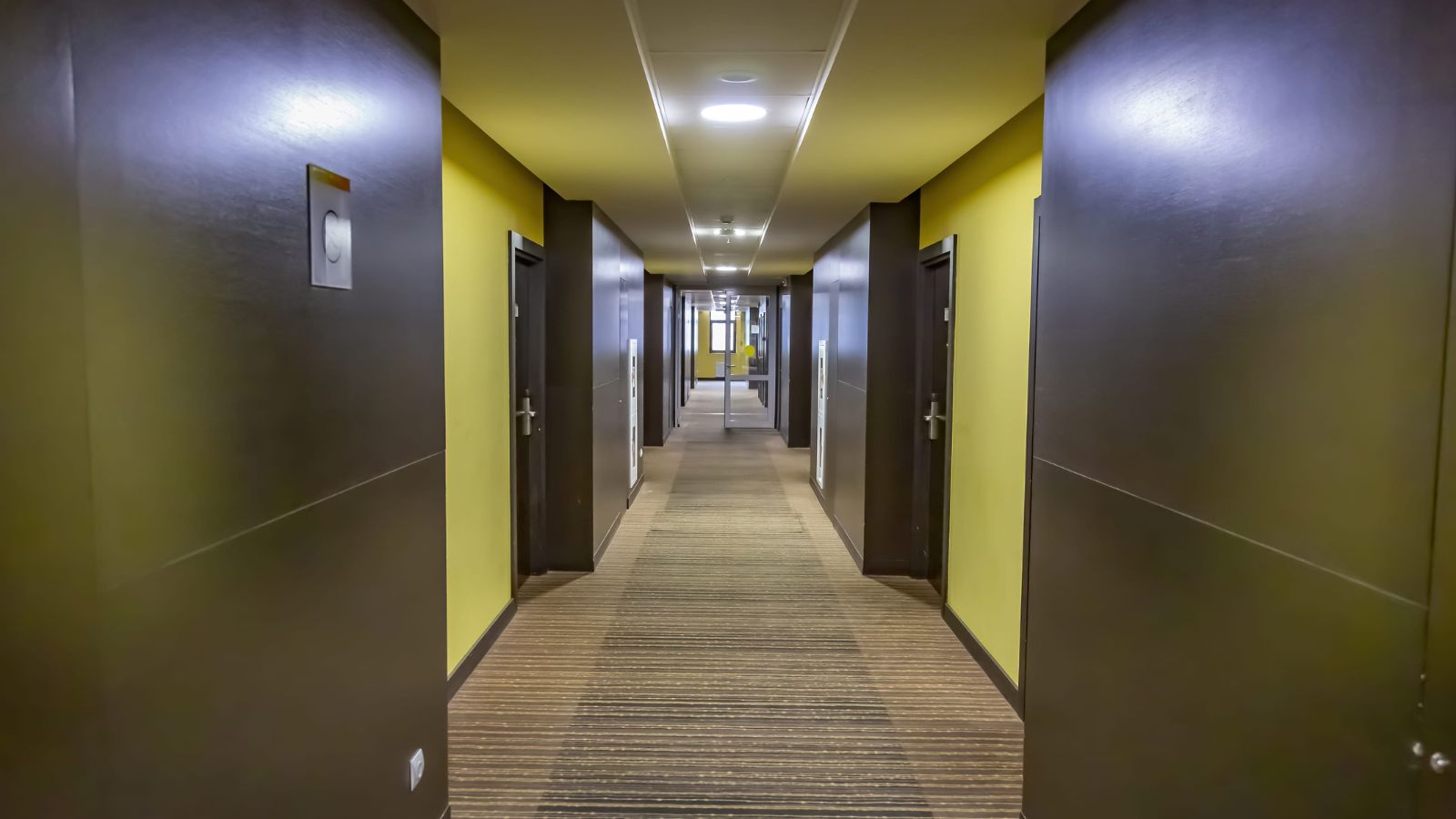 A photo of a hotel hallway.