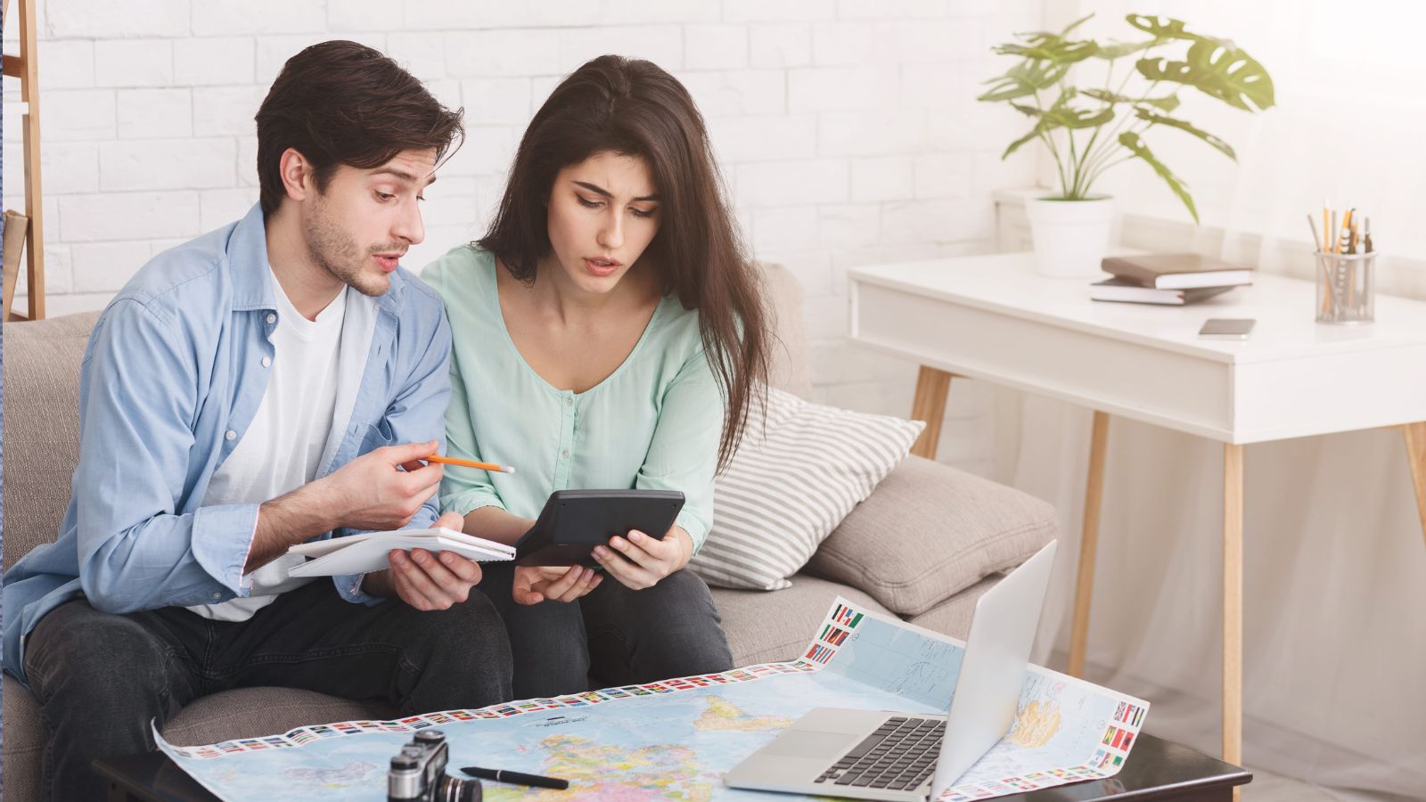 A photo of couple looking stressed checking travel itinerary on phone or map busy schedule feeling overwhelmed city background daytime candid travel moment natural light.