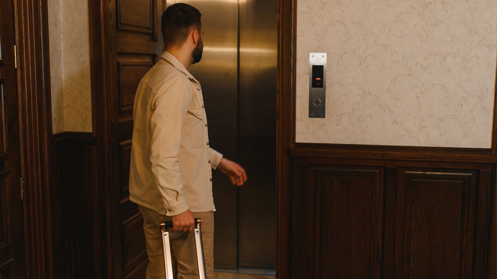 A photo of cruise ship hallway with elevator.