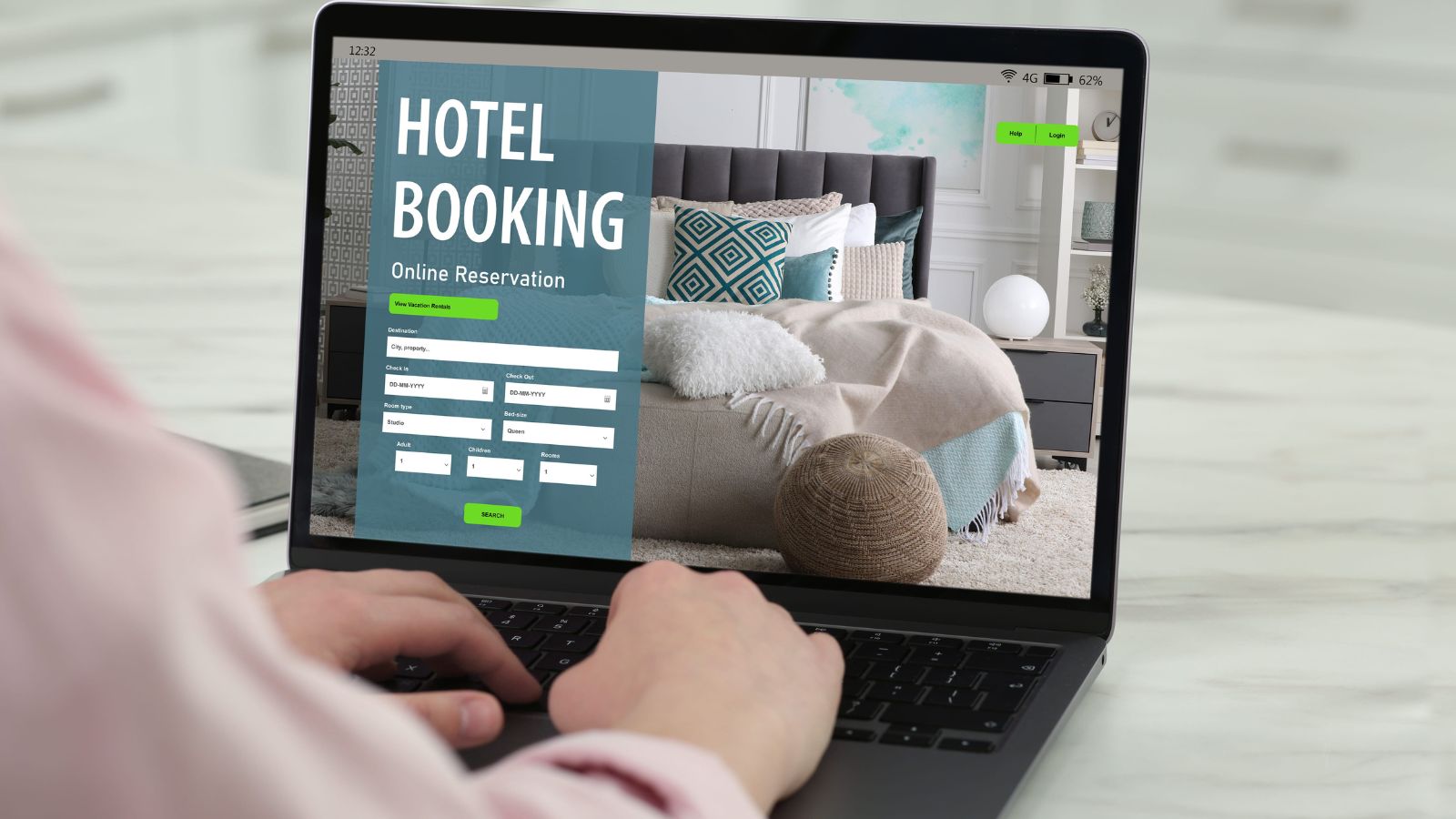 A photo of person booking hotel online comparing rooms photos prices on laptop or phone travel planning modern clean setup.