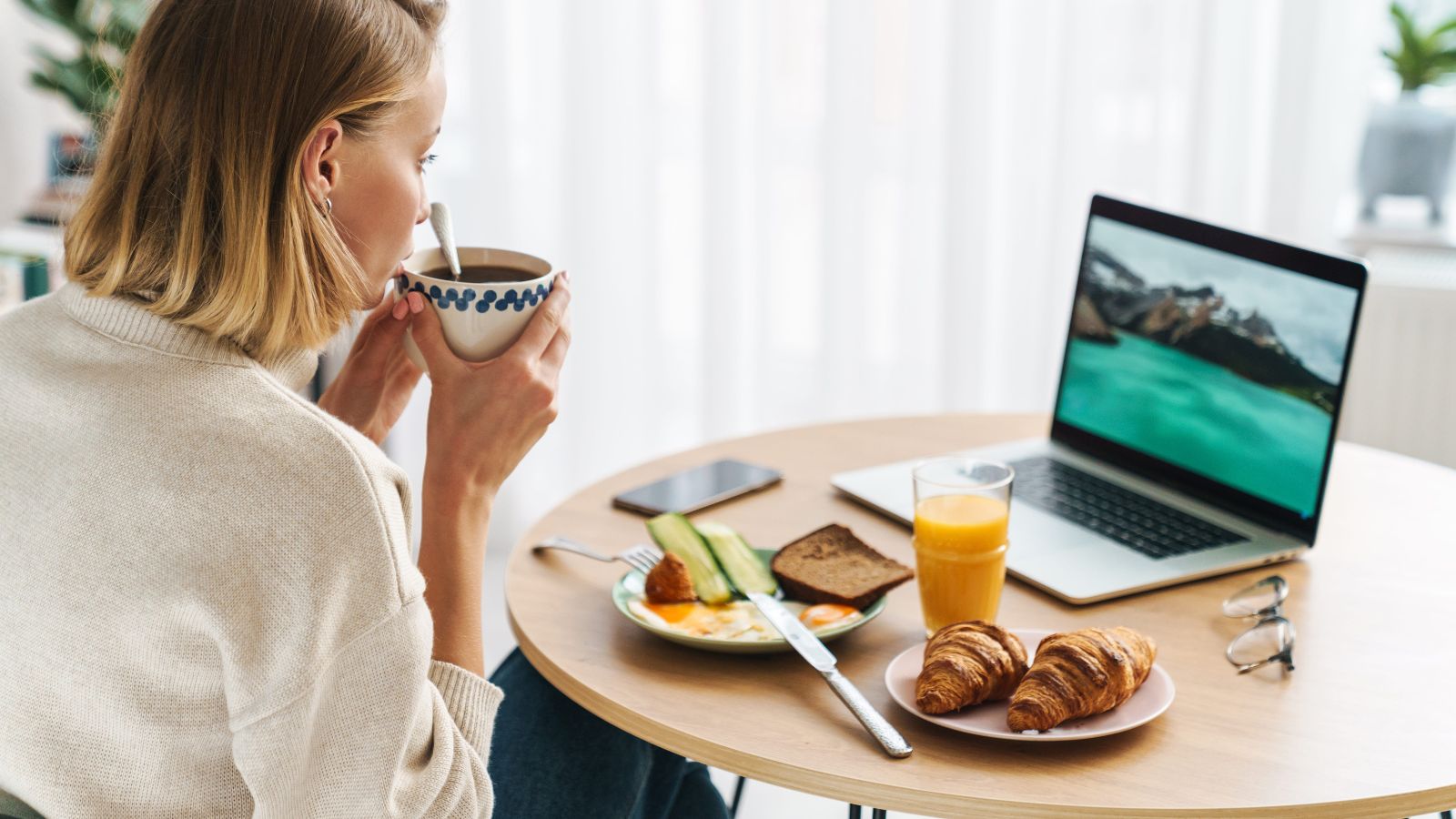 A photo of a traveler enjoying relaxed breakfast or quiet morning moment calm focused start to day peaceful routine.