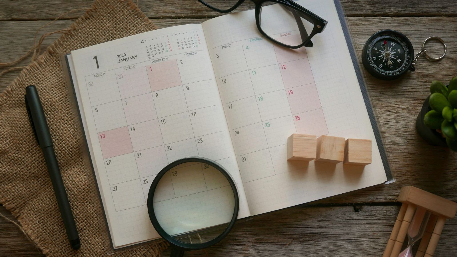 A photo of a busy travel itinerary multiple activities schedule packed day planner maps tickets organized trip flat lay.