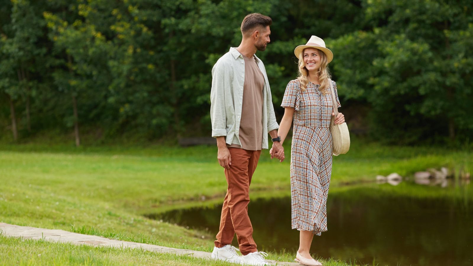 A photo of lovebirds walking together enjoying the view.