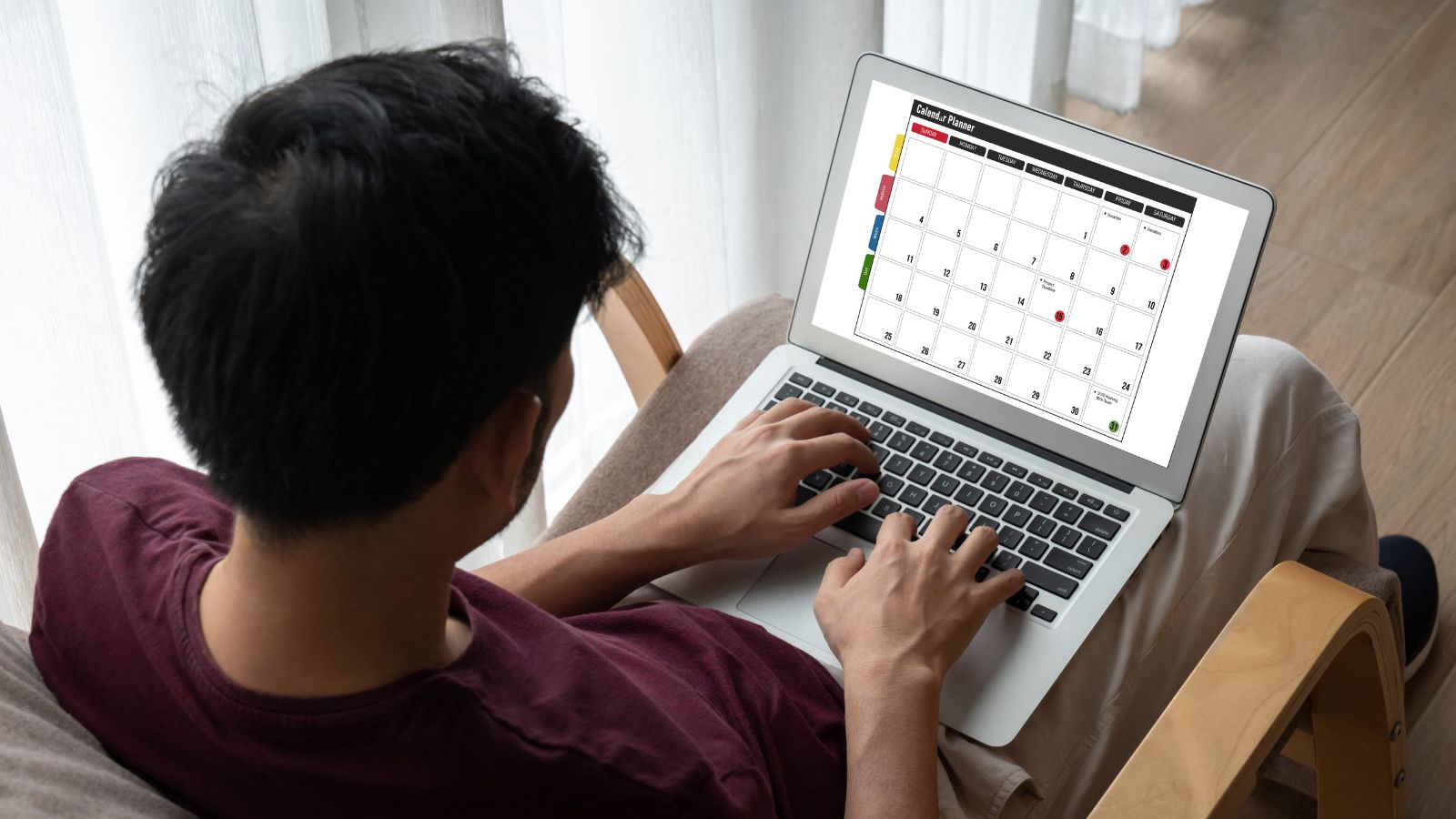 A photo of a traveler using a laptop to search flight prices online with multiple dates displayed on a calendar.