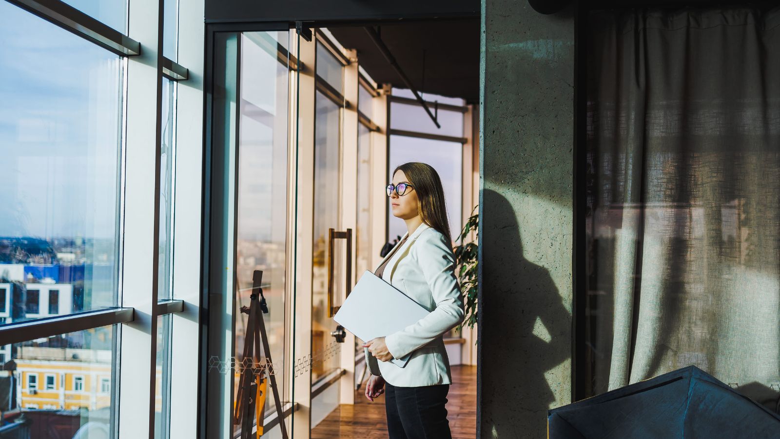A photo of a hotel room near elevator or busy street noise disturbance hallway activity or traffic outside window realistic candid.