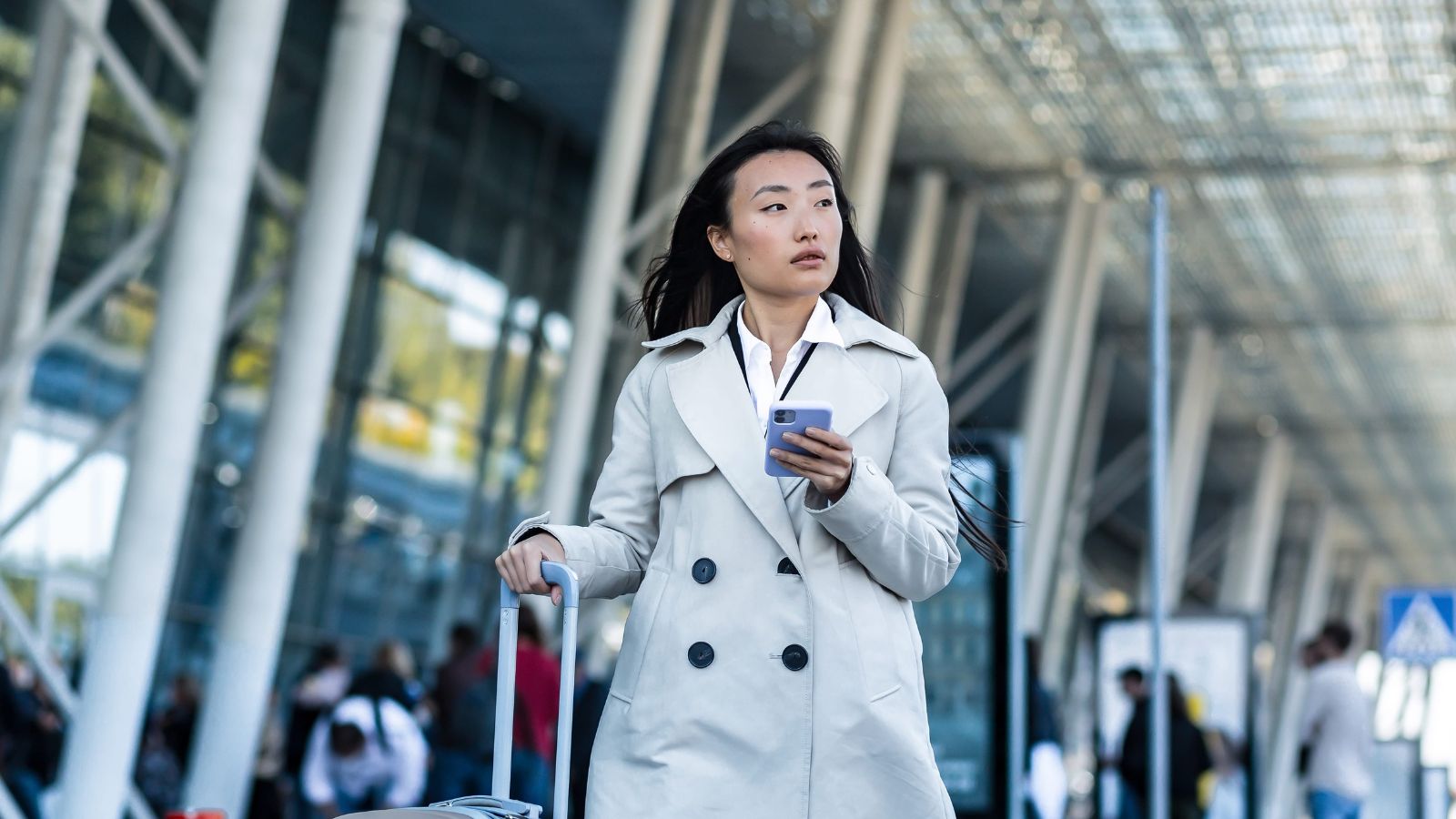 A photo of a woman, looking arriving at airport.