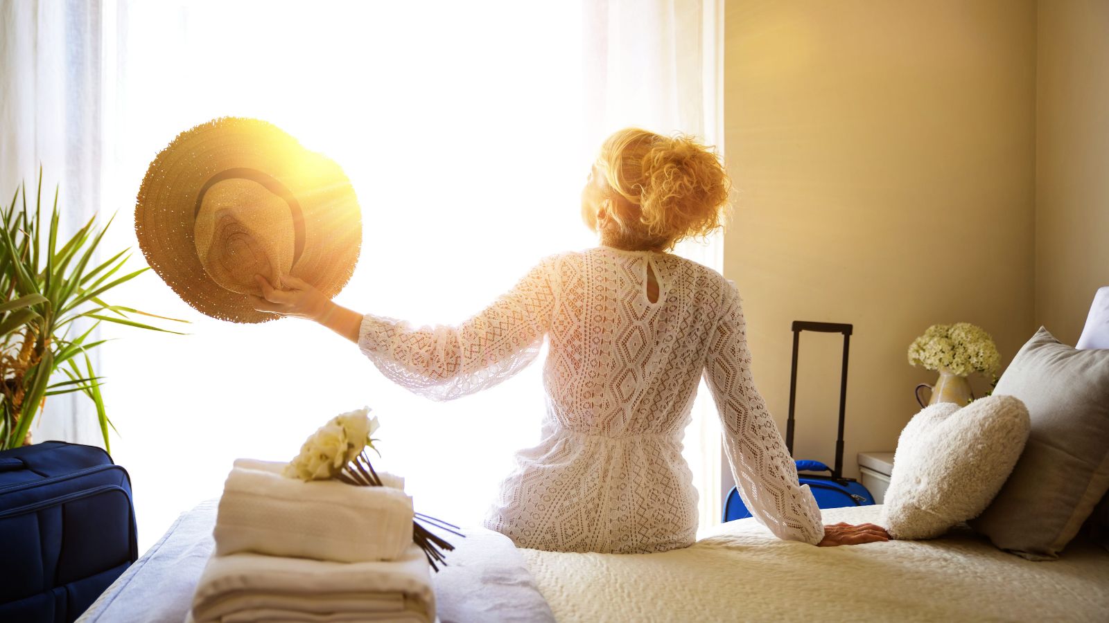 A photo of a comfortable hotel room peaceful environment traveler relaxing well rested positive stay natural light candid.